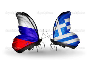 Two butterflies with flags on wings as symbol of relations Russia and Greece